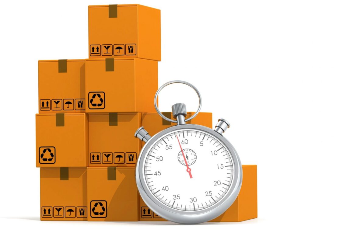 Photo of chronometer with cardboard boxes illustrates blog: "What Is Timeboxing?"