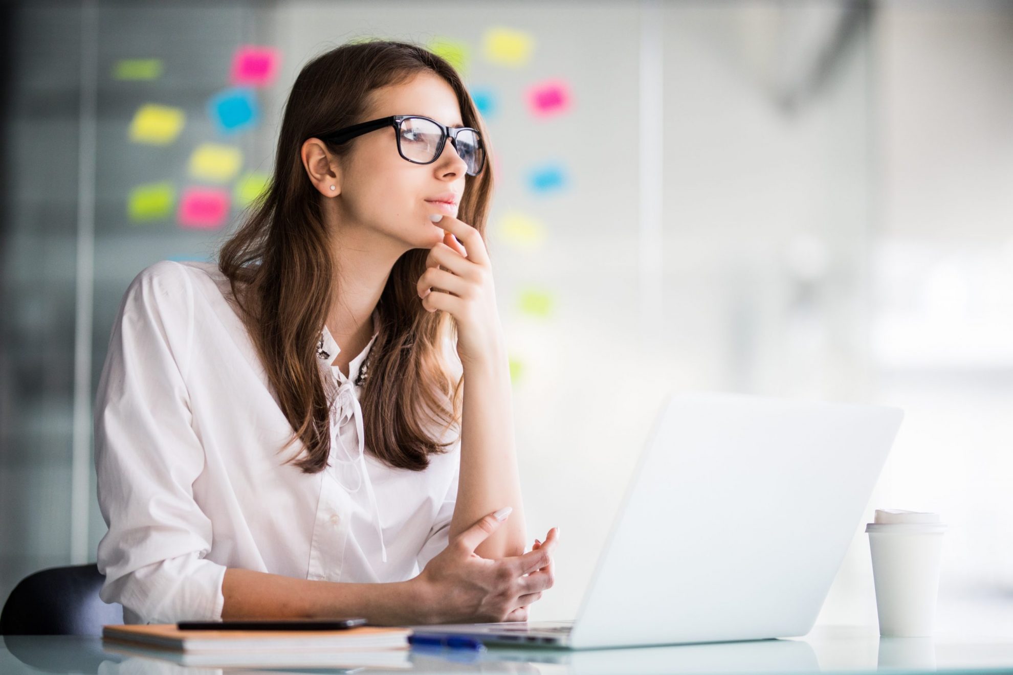 Photo of woman thinking illustrates blog: "What Is Analysis Paralysis? "