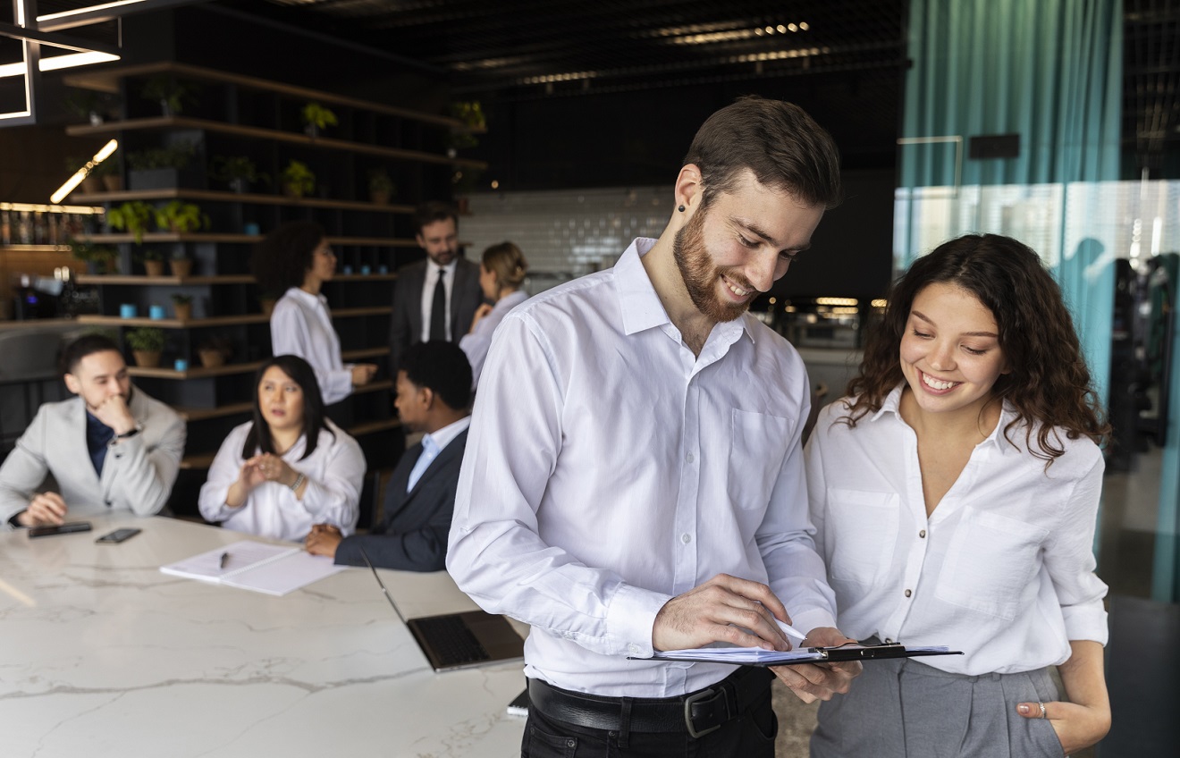 businesspeople-fp Businesspeople in office illustrate blog "How to Increase Employee Engagement"