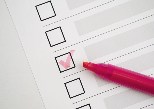 OLYMPUS DIGITAL CAMERA Closeup of checklist illustrates blog "Why You Should Start Using Checklists Today"